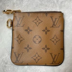 🍀SOLD🍀Authentic Trio Reverse Pouch